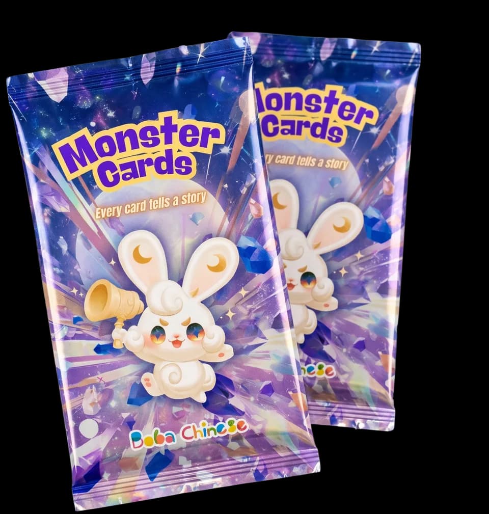 Two sealed Monster Cards foil packs